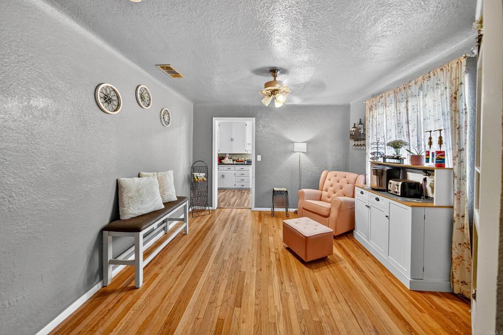 2126 Tulare Street Selma, CA 93662 - Photo 15 of 40 a bedroom with furniture and wooden floor
