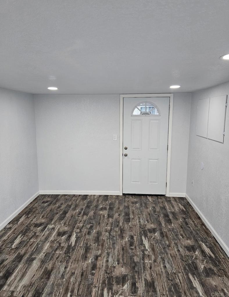 2126 Tulare Street Selma, CA 93662 - Photo 21 of 40 a view of a room with wooden floor and window