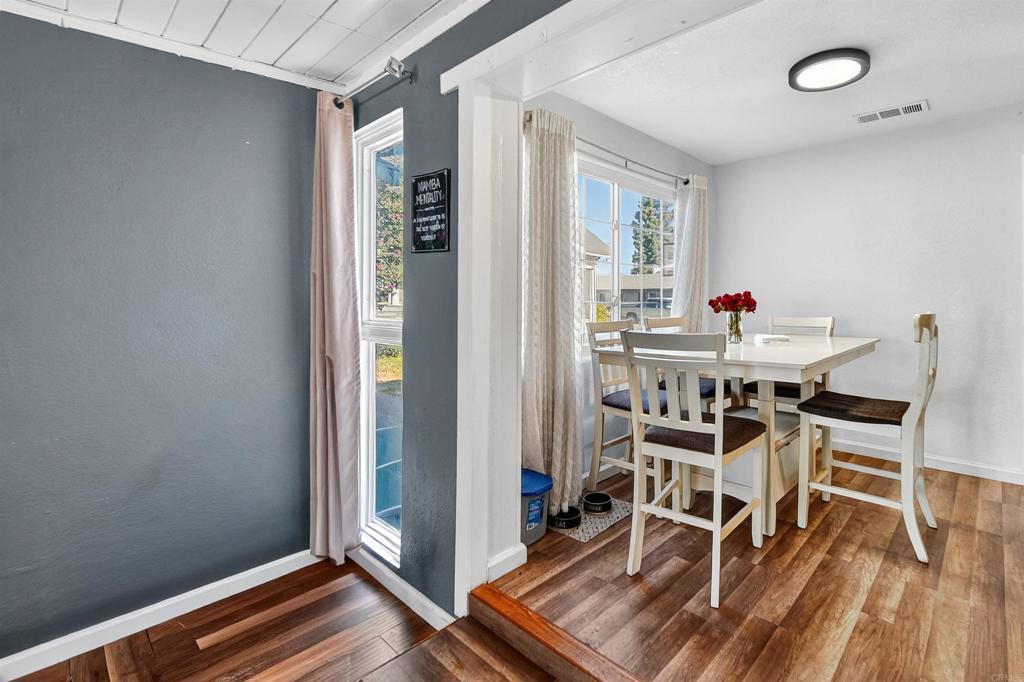 2126 Tulare Street Selma, CA 93662 - Photo 22 of 40 a view of a dining room with furniture window and wooden floor