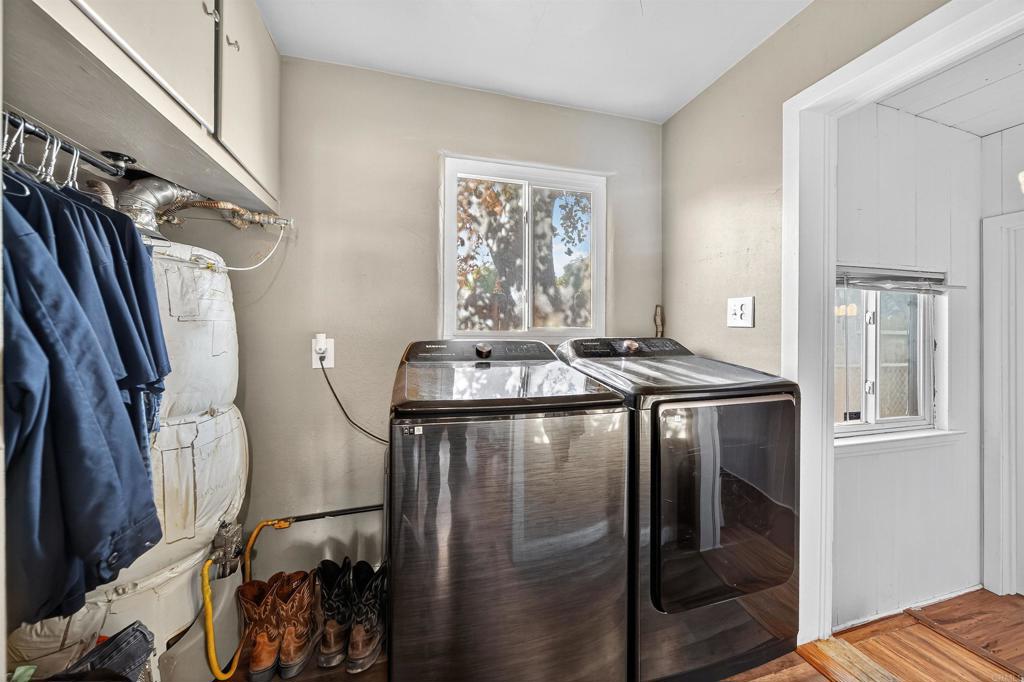 2126 Tulare Street Selma, CA 93662 - Photo 28 of 40 a kitchen with stainless steel appliances granite countertop a refrigerator and a sink