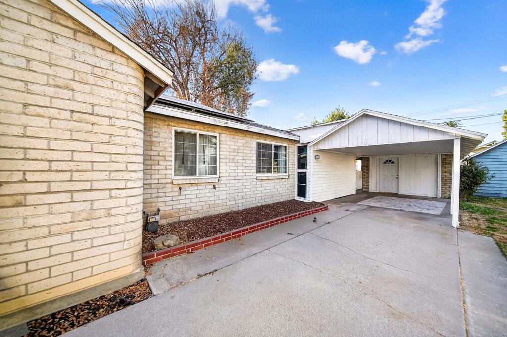 2126 Tulare Street Selma, CA 93662 - Photo 5 of 40 a view of house with backyard and glass windows
