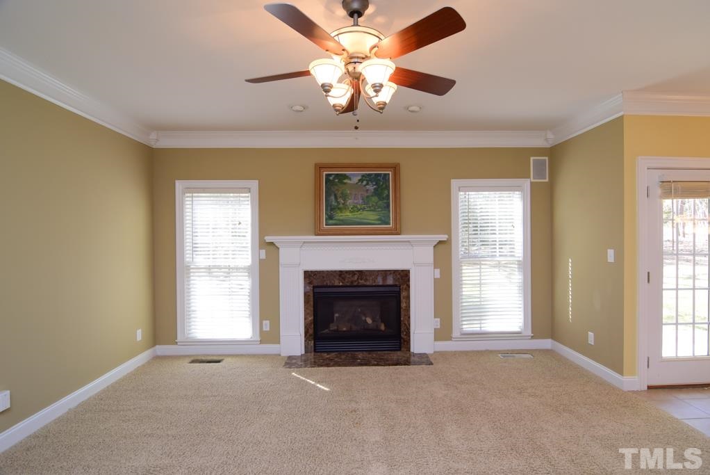 3813 April Place Raleigh, NC 27612 - Photo 18 of 25 The great room really makes a statement. It is large and there is no question whether your furniture will fit. It is right next to the kitchen and dining room so it is a great place to watch television during thanksgiving.