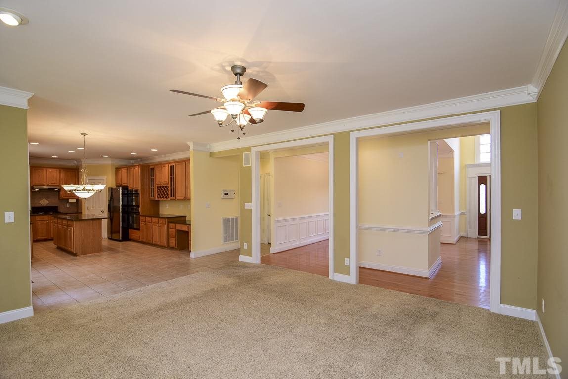 3813 April Place Raleigh, NC 27612 - Photo 19 of 25 From this perspective you can see it is a hop, skip, and jump to the kitchen.
