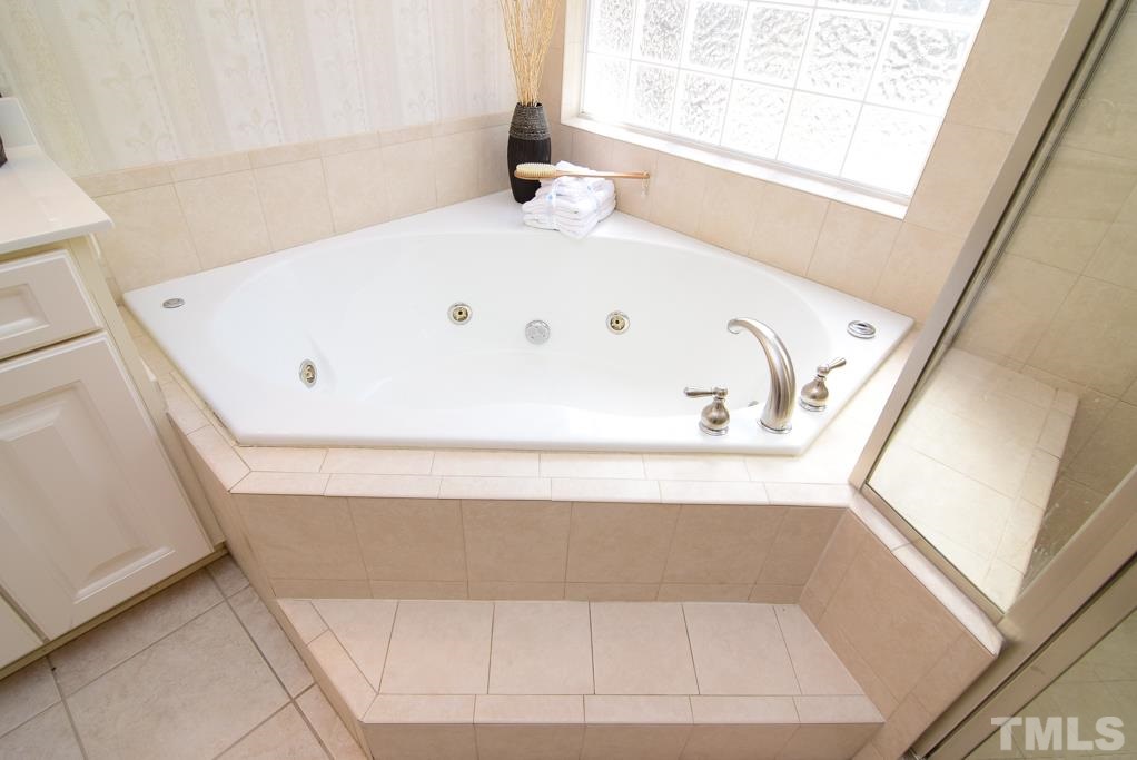 3813 April Place Raleigh, NC 27612 - Photo 10 of 25 Luxuriate in your spa bath with whirlpool jets.