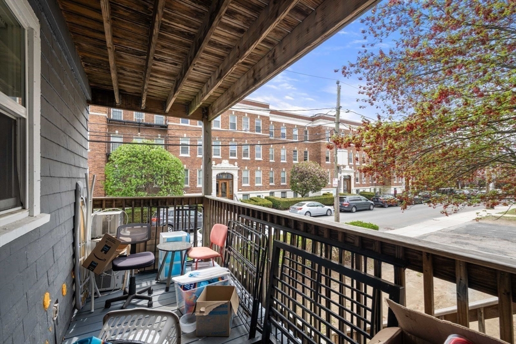 18 Claymoss Road, Unit 1 Boston, MA 02135 - Photo 21 of 24 a view of roof deck with furniture