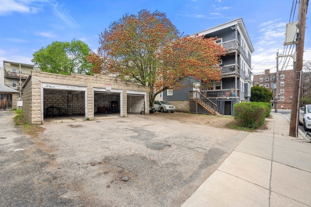 18 Claymoss Road, Unit 1 Boston, MA 02135 - Photo 24 of 24 a view of a house with a yard