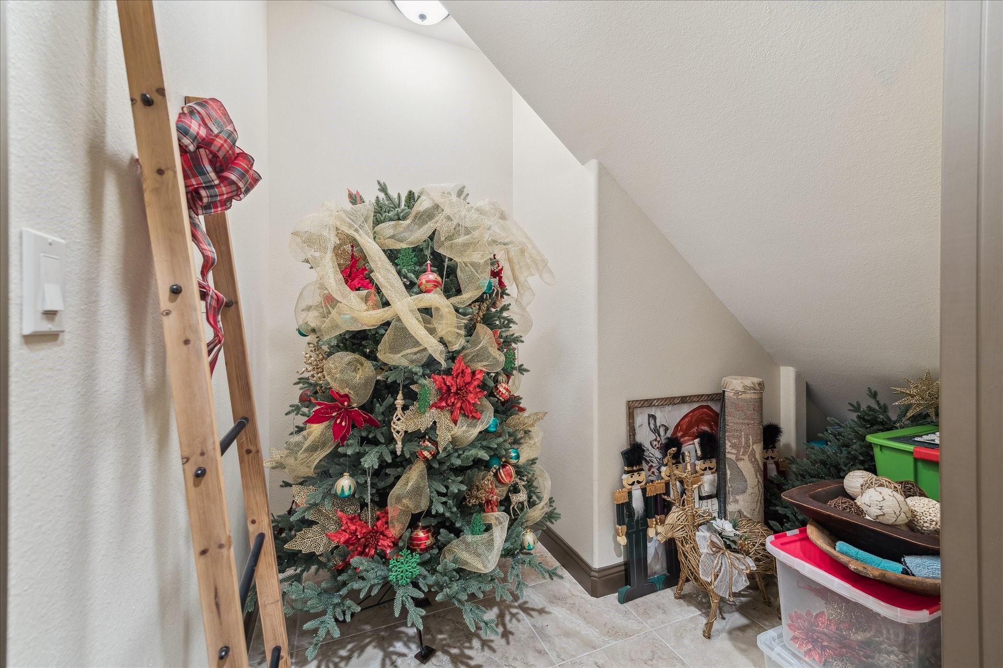 11 Willowcreek Ranch Road Tomball, TX 77377 - Photo 29 of 49 An oversized storage closet with double doors for access is used by this homeowner for their seasonal décor and Christmas tree storage. This enables them to never have to take down the tree!