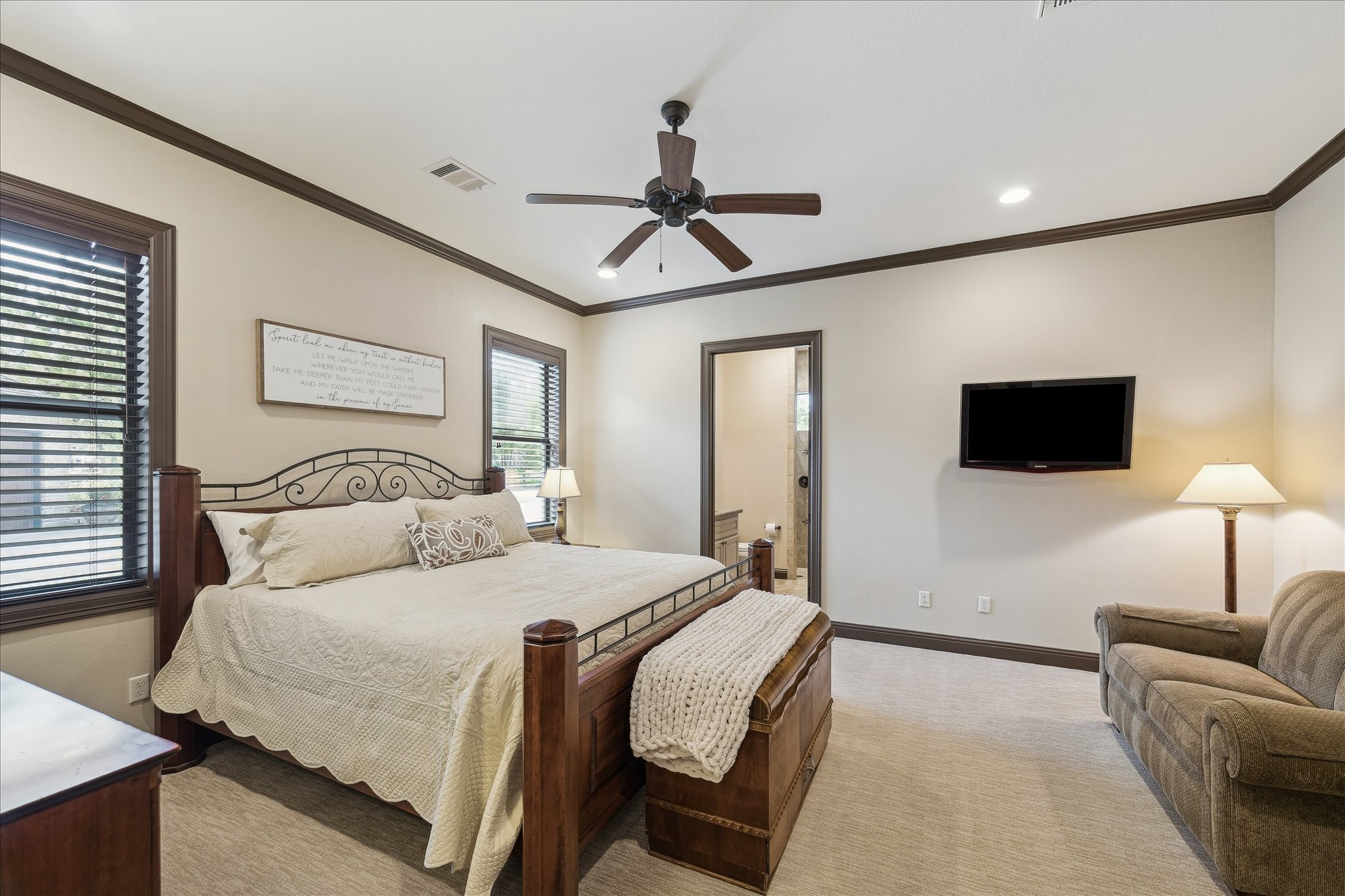 11 Willowcreek Ranch Road Tomball, TX 77377 - Photo 30 of 49 This sprawling one story features 4 bedrooms all on one level. This secondary bedroom is generously sized and features a walk-in closet and dedicated ensuite bath with walk in shower.