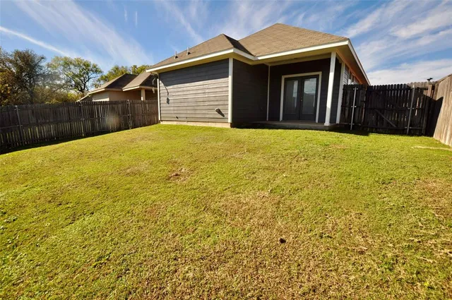 a front view of a house with a garage