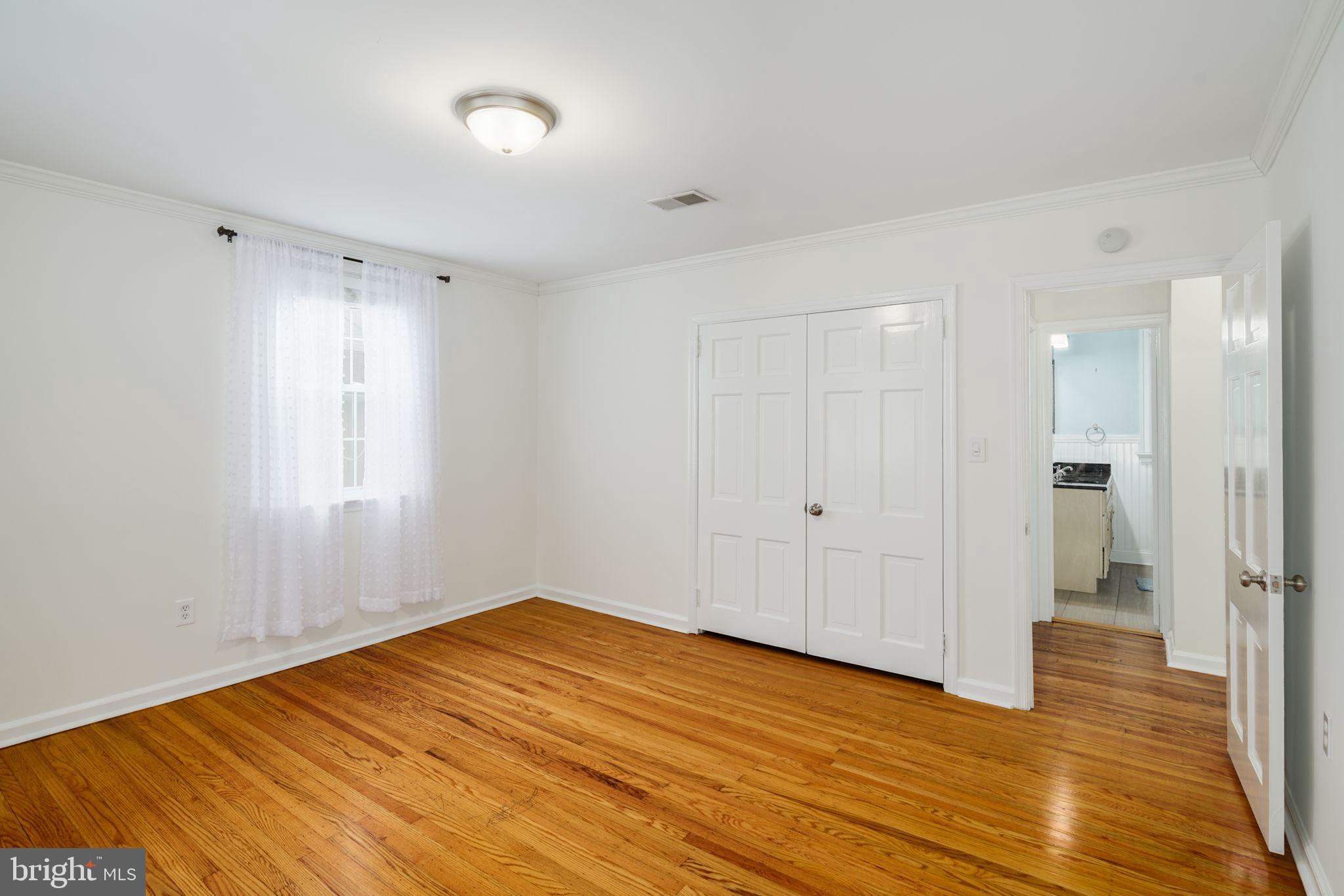 499 Irish Road Berwyn, PA 19312 - Photo 11 of 29 Primary Bedroom w/ Great Closet Space (Main Level)