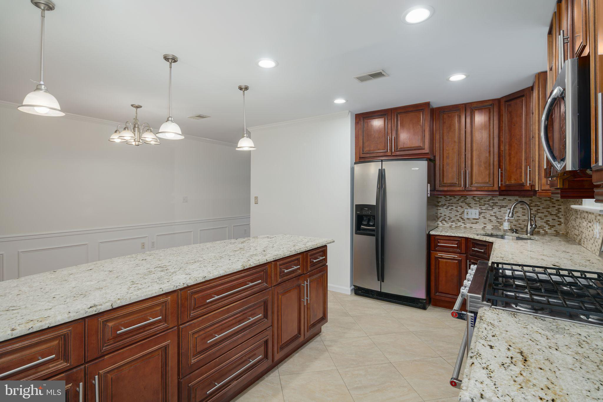 499 Irish Road Berwyn, PA 19312 - Photo 2 of 29 Kitchen w/Granite and Stainless Steel Appliances