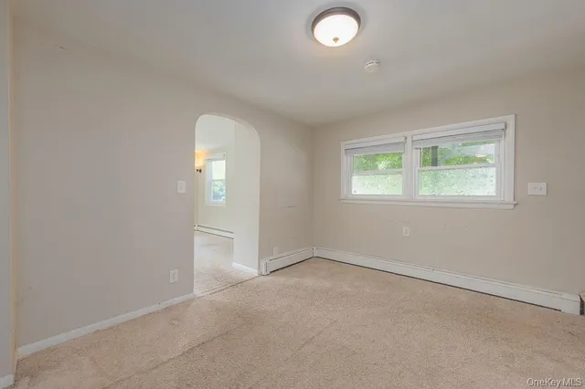 an empty room that has a window