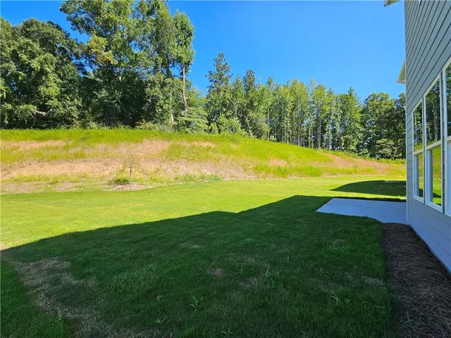a bathroom with a sink double vanity and a mirror