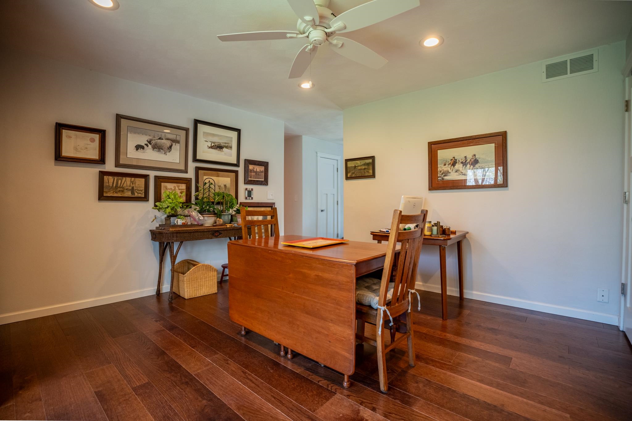 5968 East Bradley Road Byron, IL 61010 - Photo 16 of 40 a view of a dining room with furniture and wooden floor