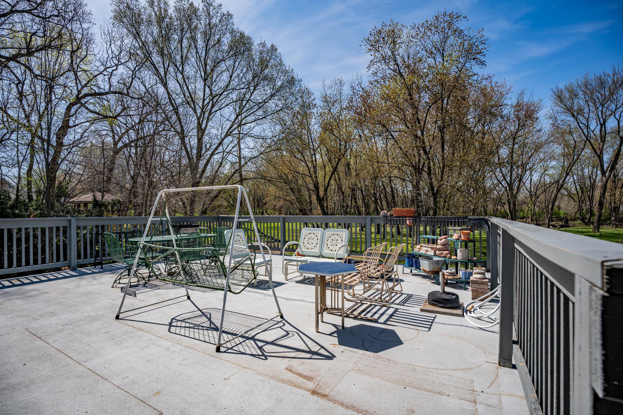 5968 East Bradley Road Byron, IL 61010 - Photo 27 of 40 a view of backyard with seating space and trees in the background
