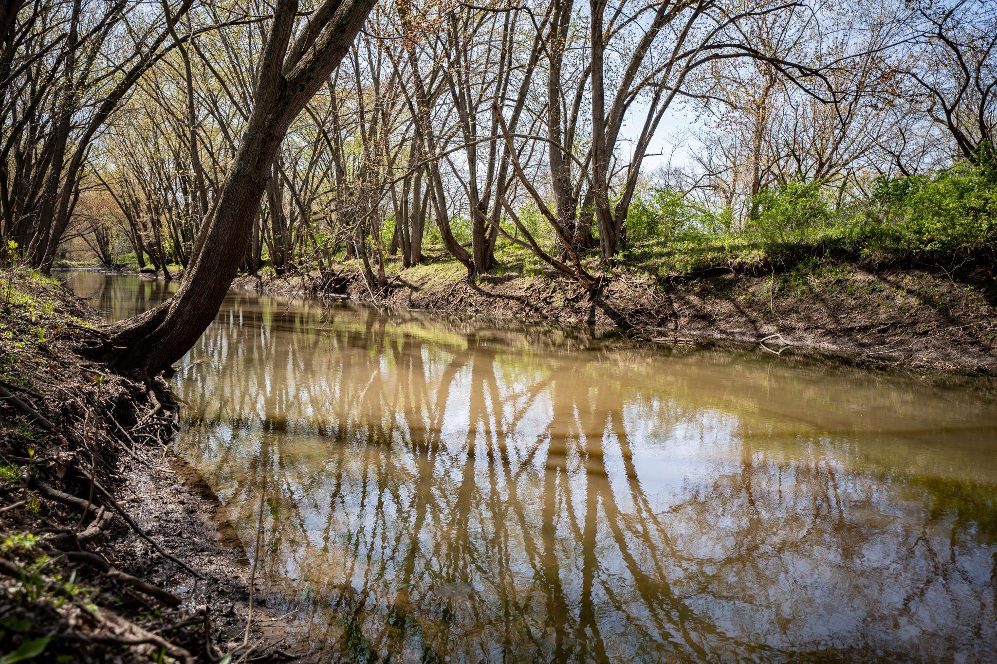 5968 East Bradley Road Byron, IL 61010 - Photo 30 of 40 a backyard of a house with a yard and outdoor seating