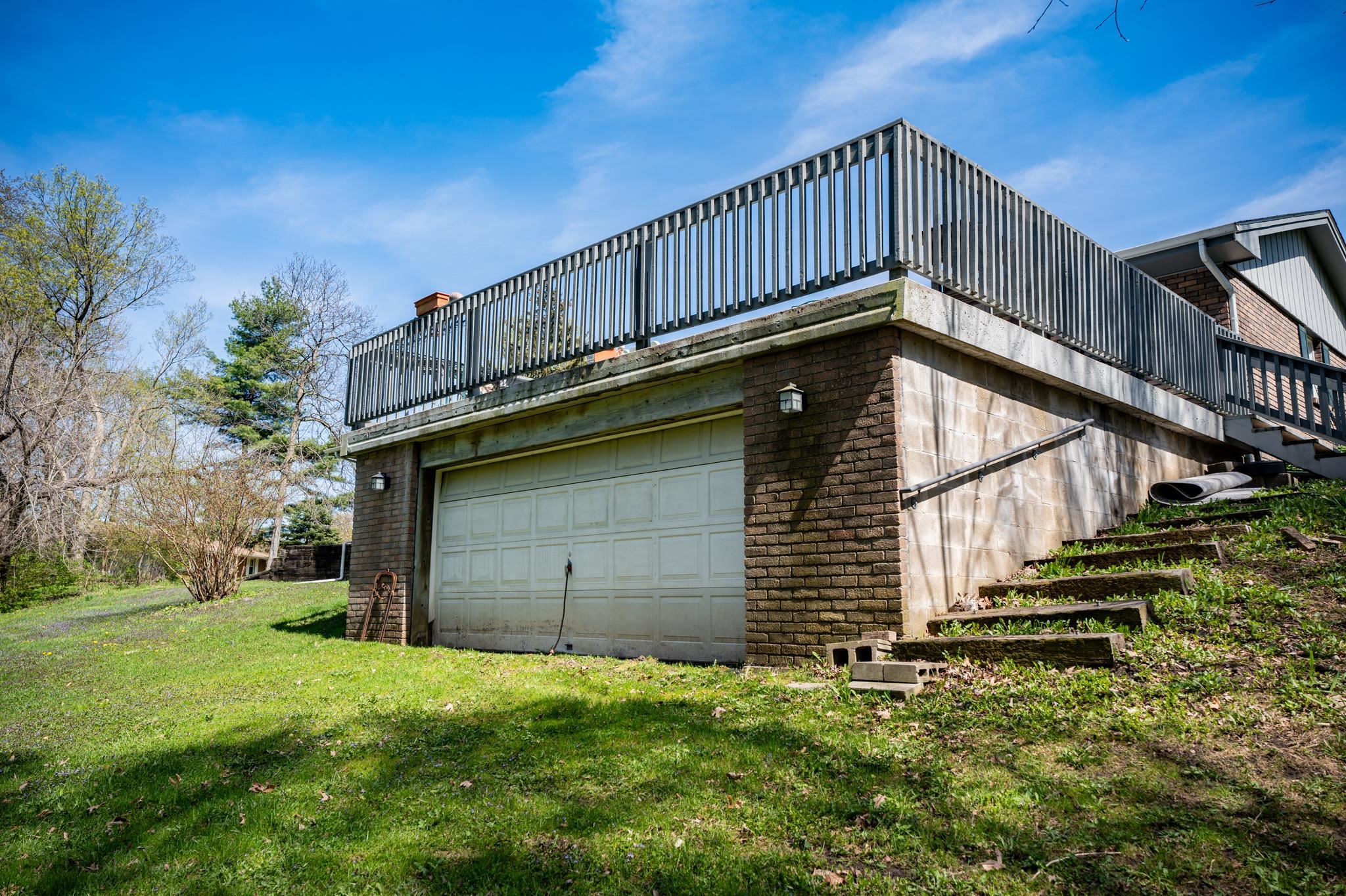 5968 East Bradley Road Byron, IL 61010 - Photo 32 of 40 a view of a house with a yard