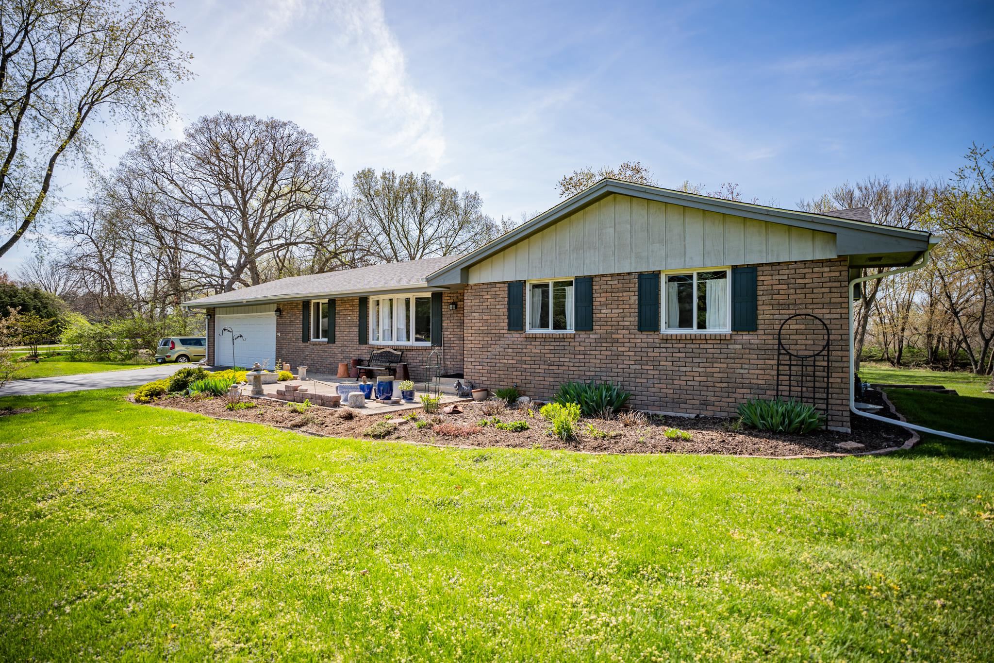 5968 East Bradley Road Byron, IL 61010 - Photo 4 of 40 front view of a house with a yard