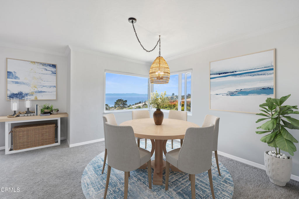 2335 Whitney Avenue Summerland, CA 93067 - Photo 11 of 33 a view of a dining room with furniture and a potted plant