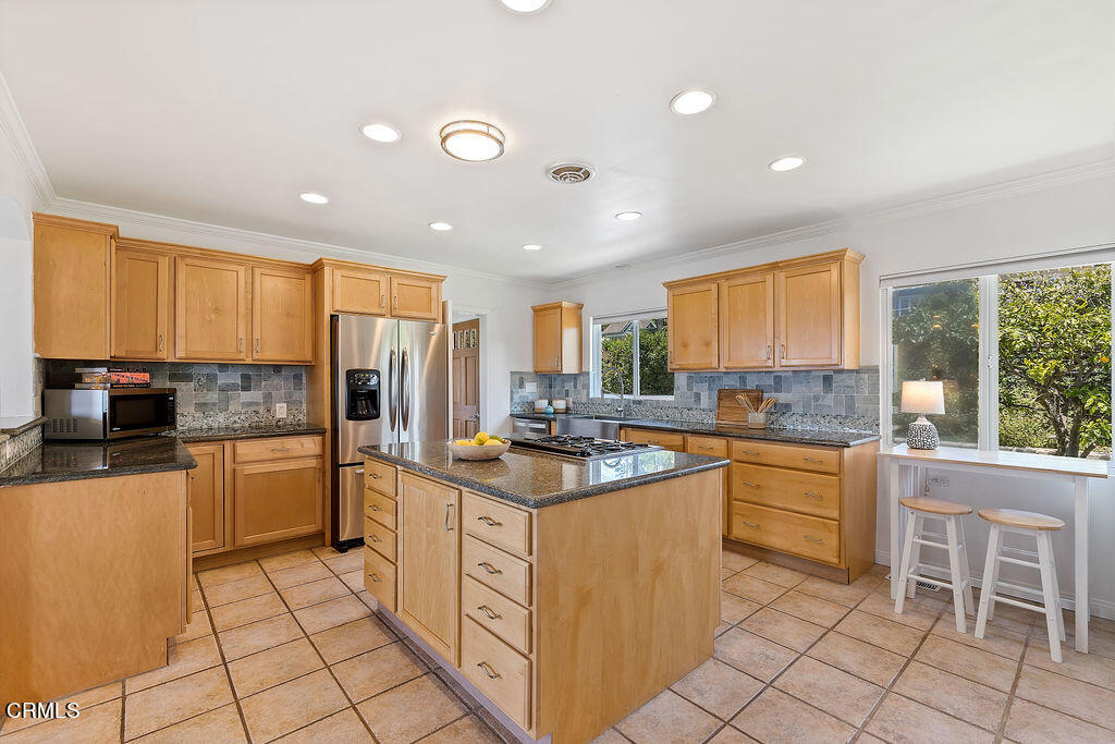 2335 Whitney Avenue Summerland, CA 93067 - Photo 13 of 33 a kitchen with appliances cabinets and a sink