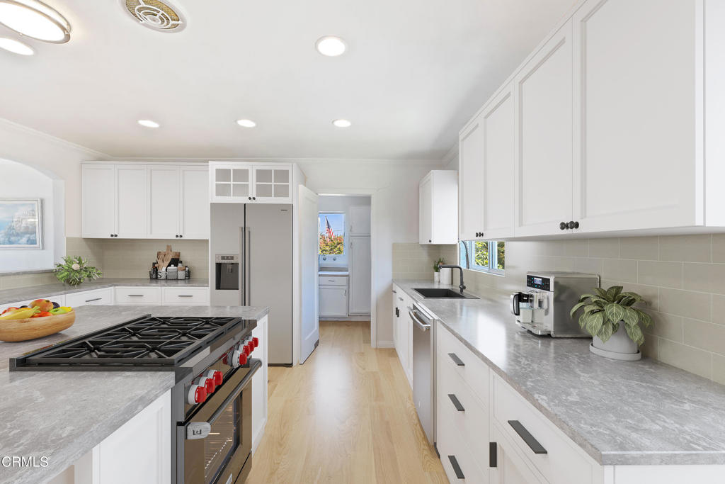 2335 Whitney Avenue Summerland, CA 93067 - Photo 14 of 33 a kitchen with stainless steel appliances granite countertop a sink stove and refrigerator