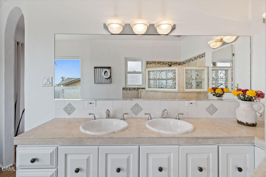 2335 Whitney Avenue Summerland, CA 93067 - Photo 21 of 33 a bathroom with a sink and a mirror