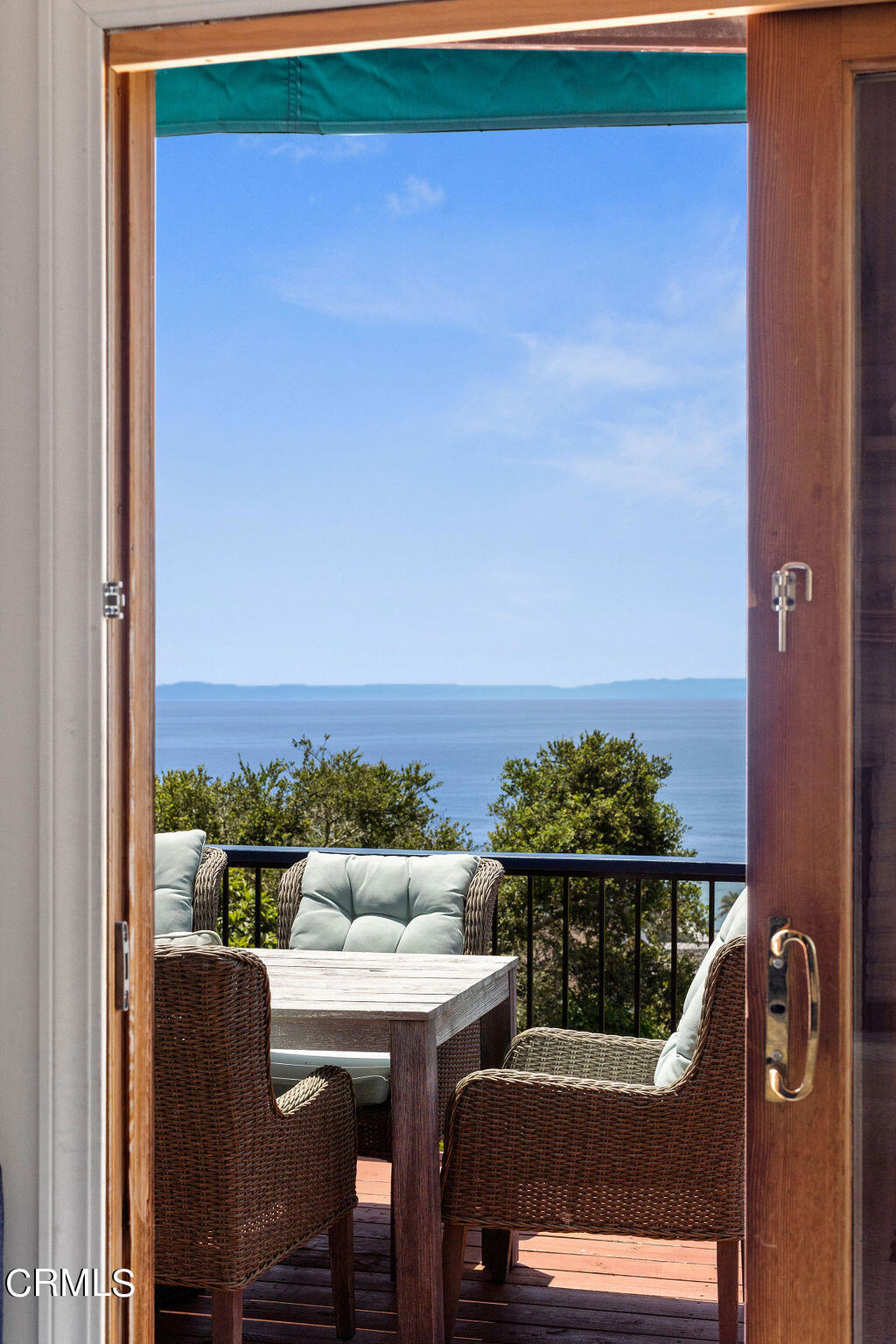 2335 Whitney Avenue Summerland, CA 93067 - Photo 27 of 33 a balcony with a table and chairs