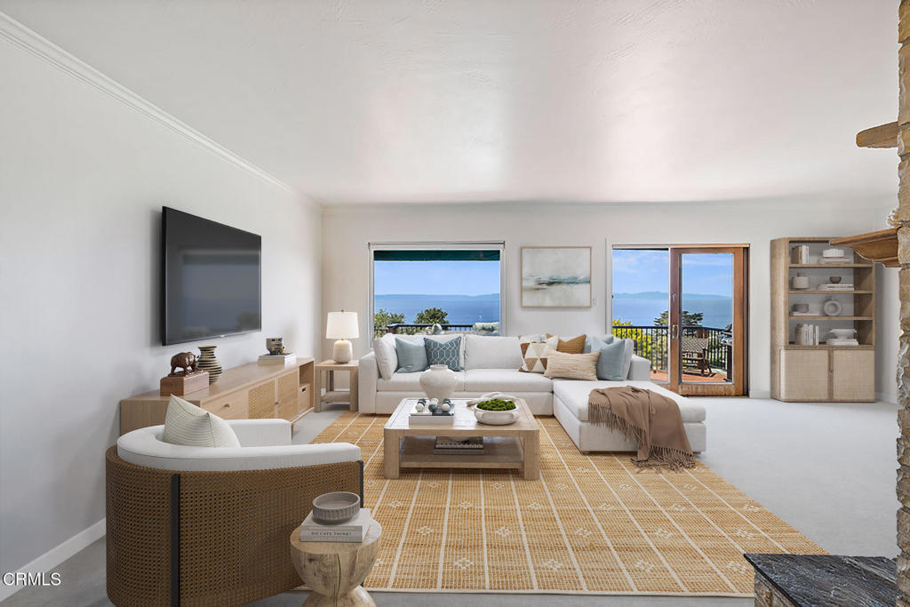 2335 Whitney Avenue Summerland, CA 93067 - Photo 7 of 33 a living room with furniture and a flat screen tv