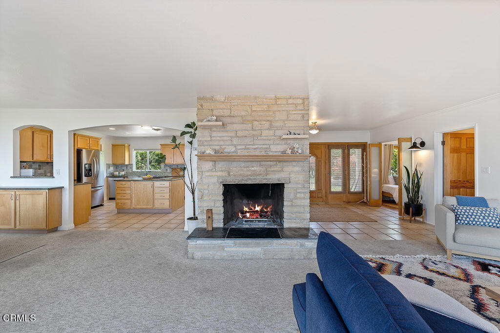 2335 Whitney Avenue Summerland, CA 93067 - Photo 10 of 33 a living room with furniture and a fireplace
