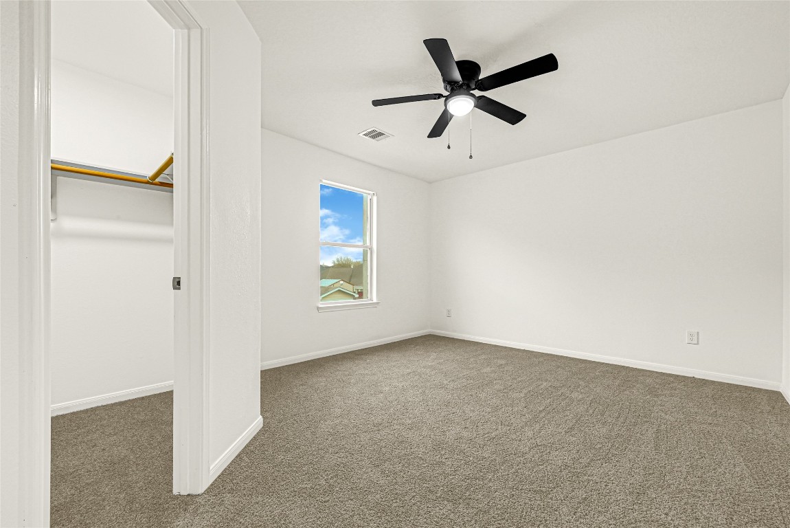 1914 Rock Ridge Drive Houston, TX 77049 - Photo 11 of 26 a view of a livingroom with a ceiling fan & window