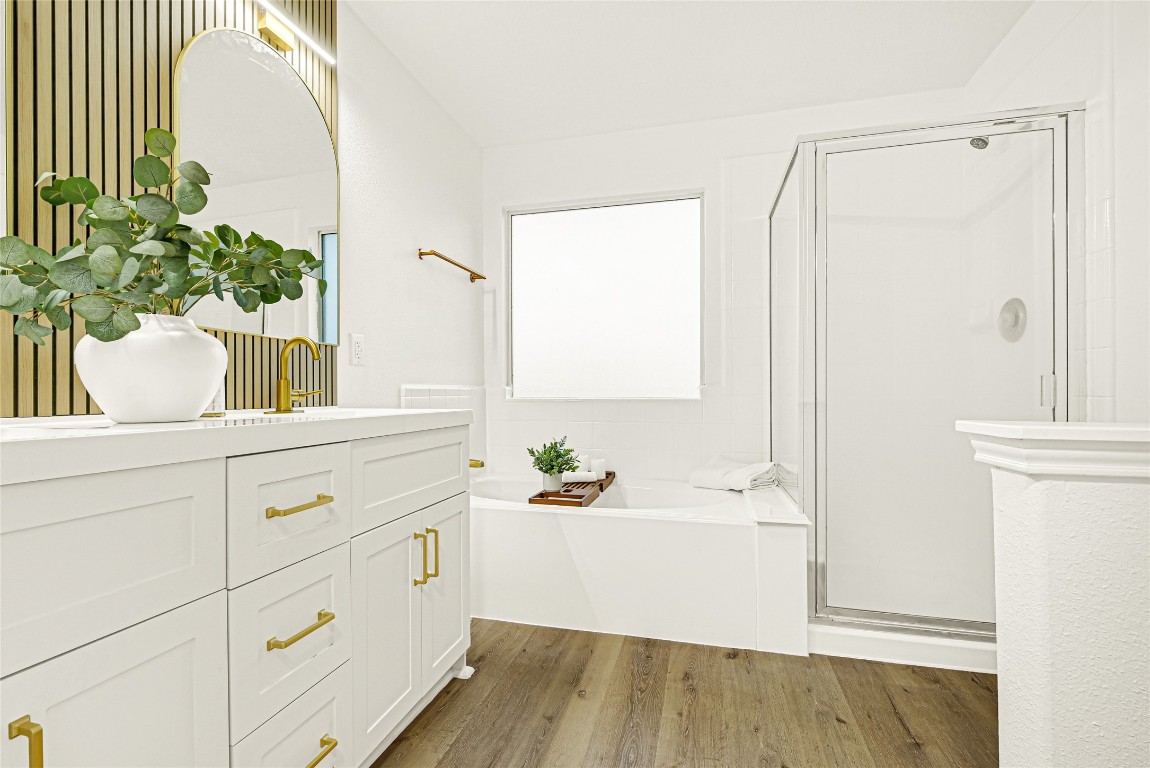 1914 Rock Ridge Drive Houston, TX 77049 - Photo 17 of 26 a bathroom with a sink and a mirror