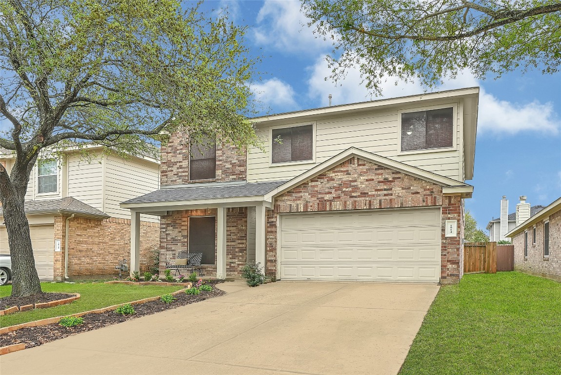 1914 Rock Ridge Drive Houston, TX 77049 - Photo 25 of 26 front view of house with a yard