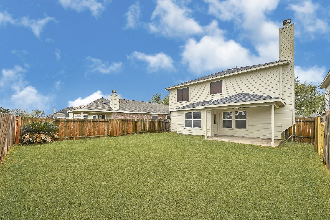 1914 Rock Ridge Drive Houston, TX 77049 - Photo 26 of 26 a view of a house with a yard