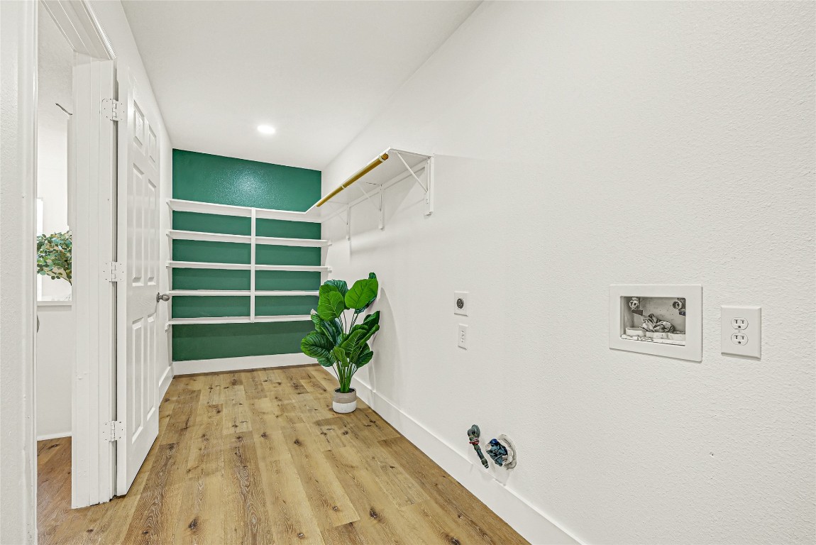 1914 Rock Ridge Drive Houston, TX 77049 - Photo 7 of 26 a bathroom with a tub and shower