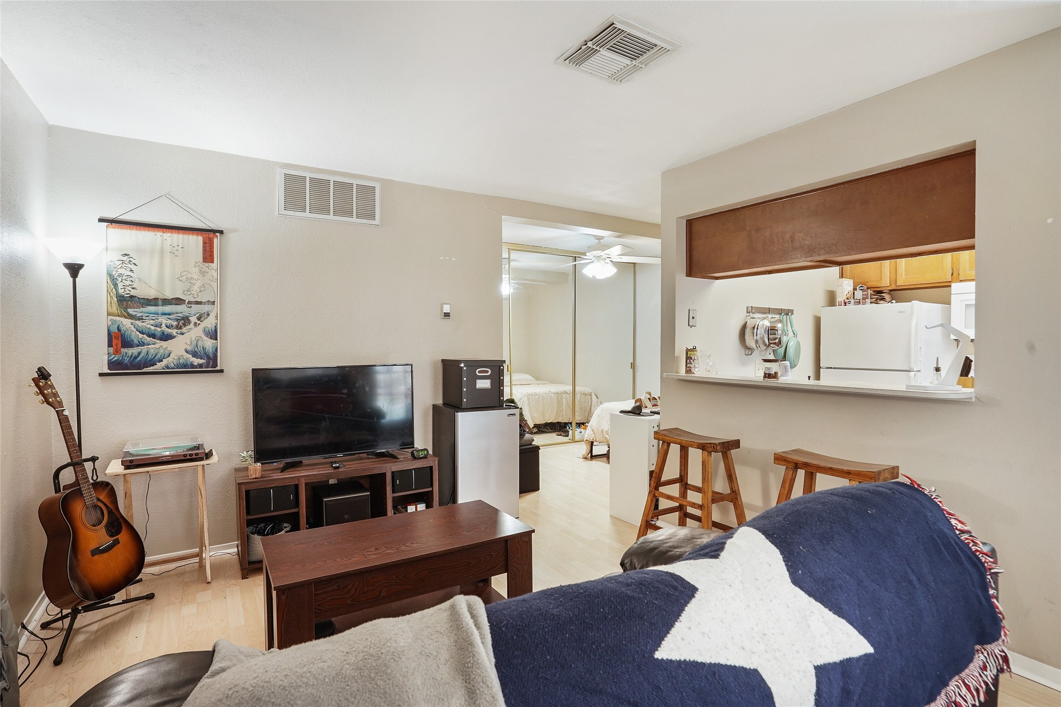 2110 Rio Grande Street, Unit 103 Austin, TX 78705 - Photo 1 of 1 Living area looking into bedroom and kitchen