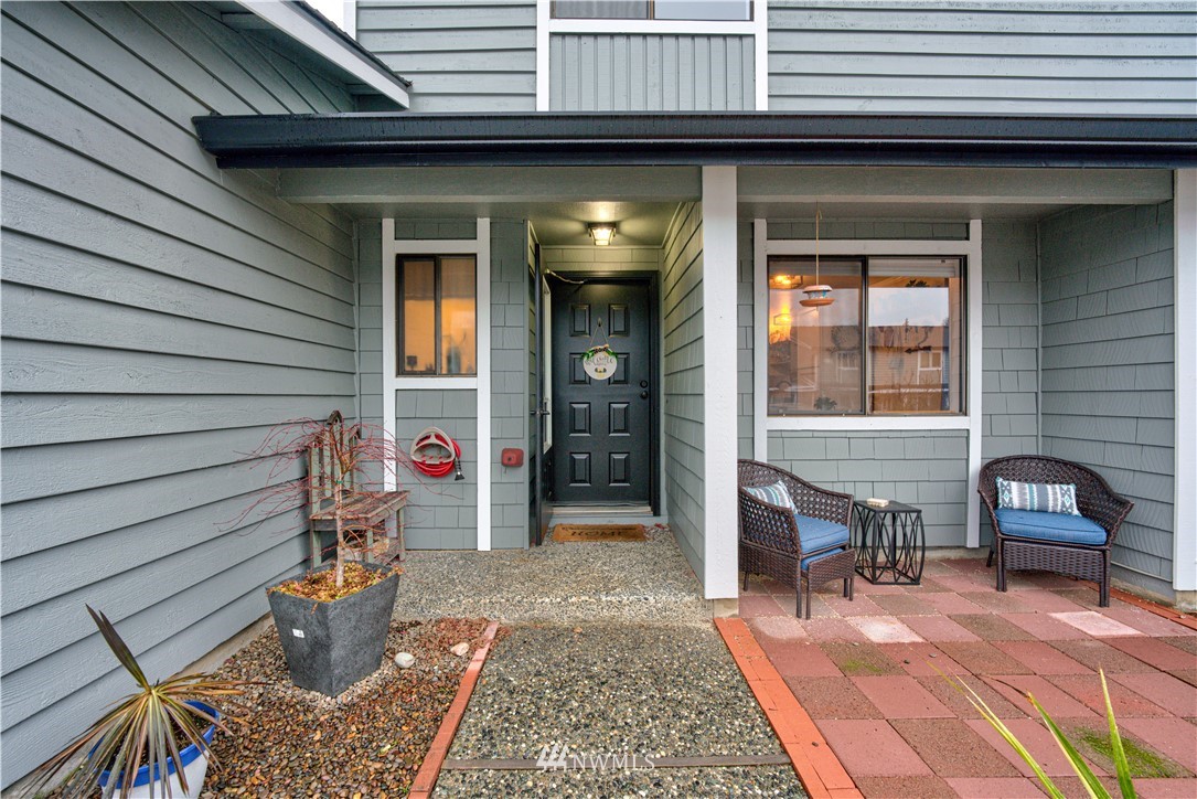 21515 4th Avenue West, Unit A72 Bothell, WA 98021 - Photo 1 of 36 a backyard of a house with seating space