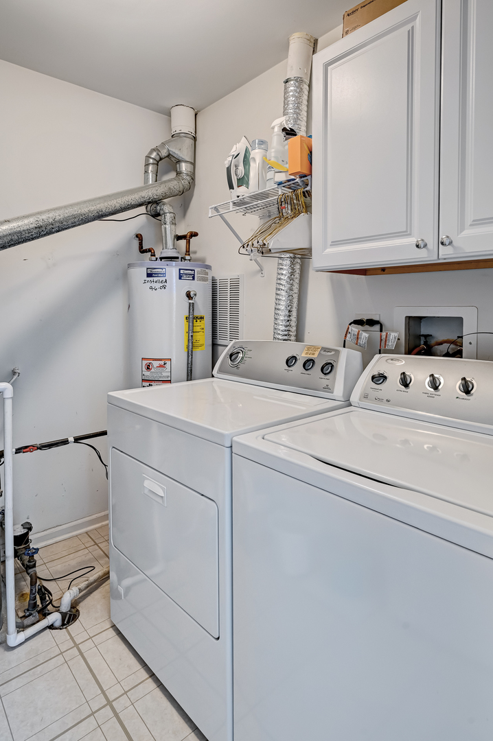 8150 Ripple Ridge Darien, IL 60561 - Photo 11 of 14 a kitchen with cabinets and appliances