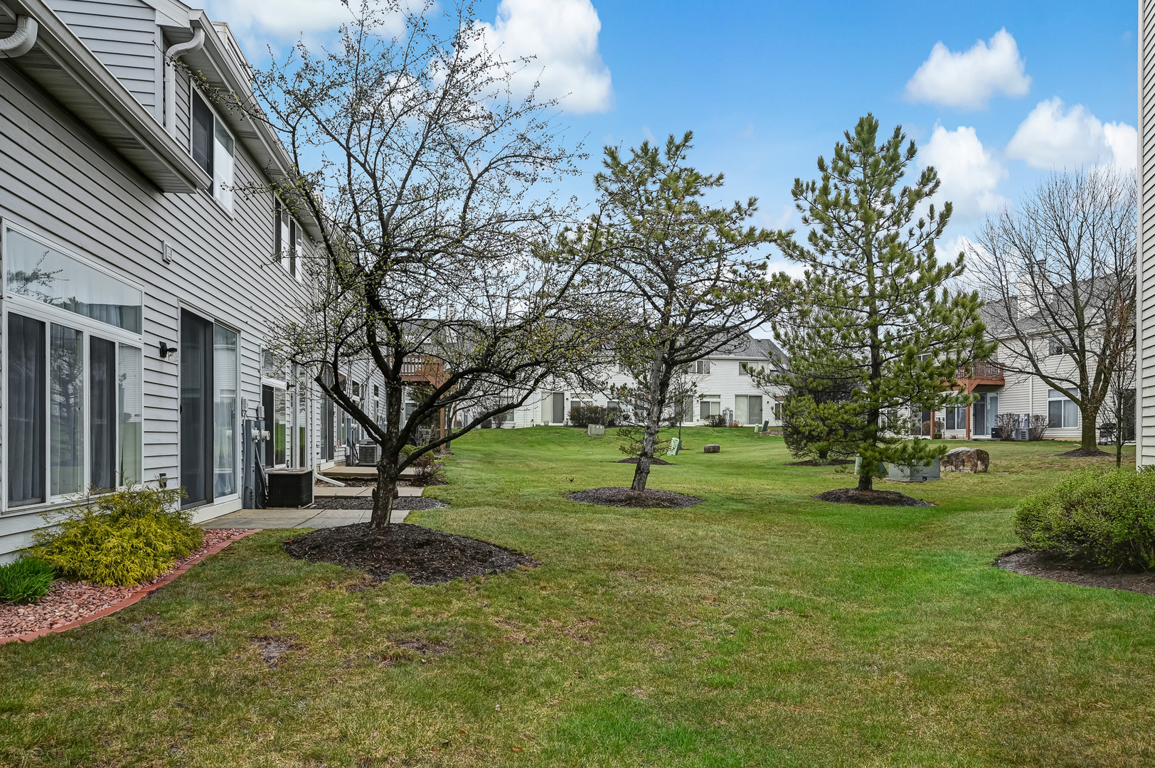 8150 Ripple Ridge Darien, IL 60561 - Photo 14 of 14 a view of a house with a yard