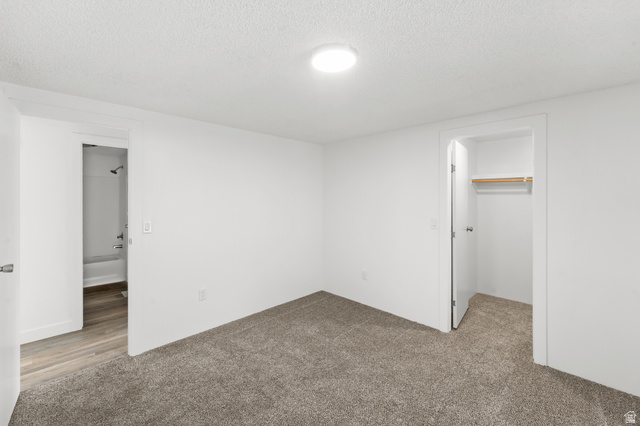 2875 North 400 West, Unit 7 Layton, UT 84041 - Photo 16 of 29 Carpeted room featuring a ceiling-mounted light fixture, white walls, and a closet with a built-in rod