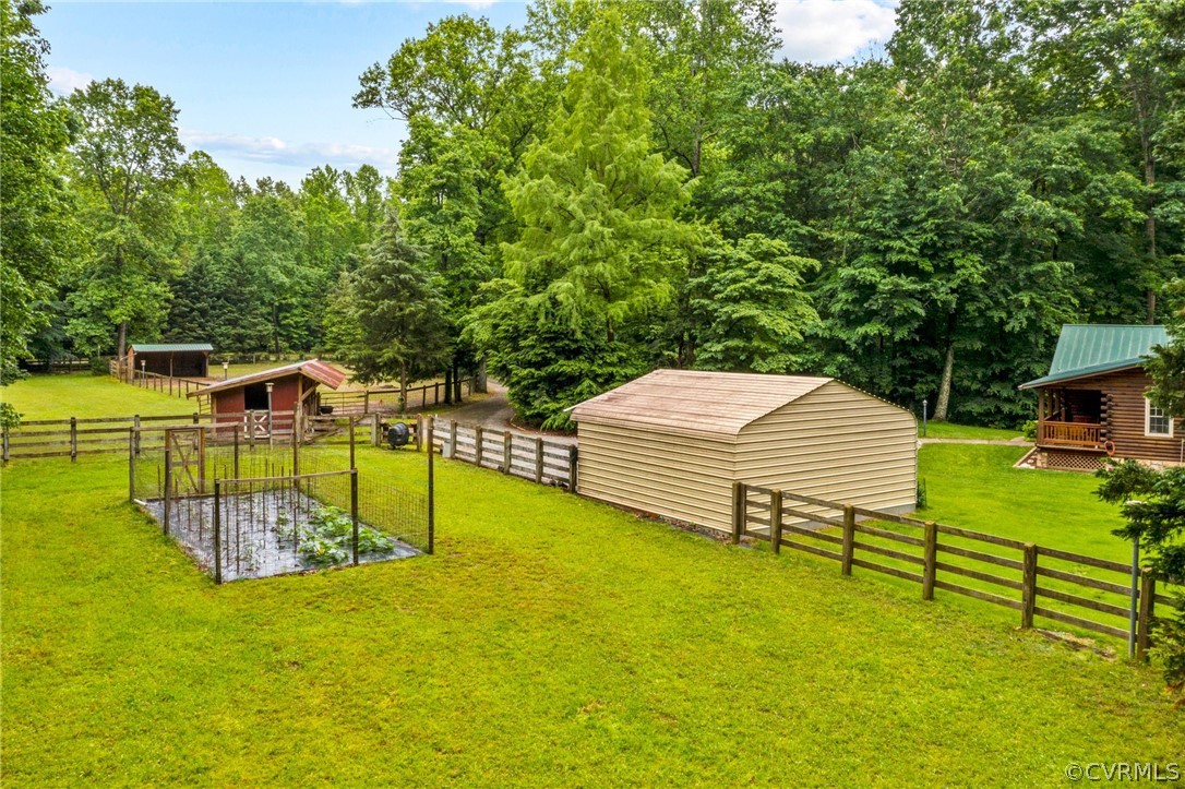 9500 Crumps Mill Road Quinton, VA 23141 - Photo 43 of 47 Side of property with carport, barn and run in she