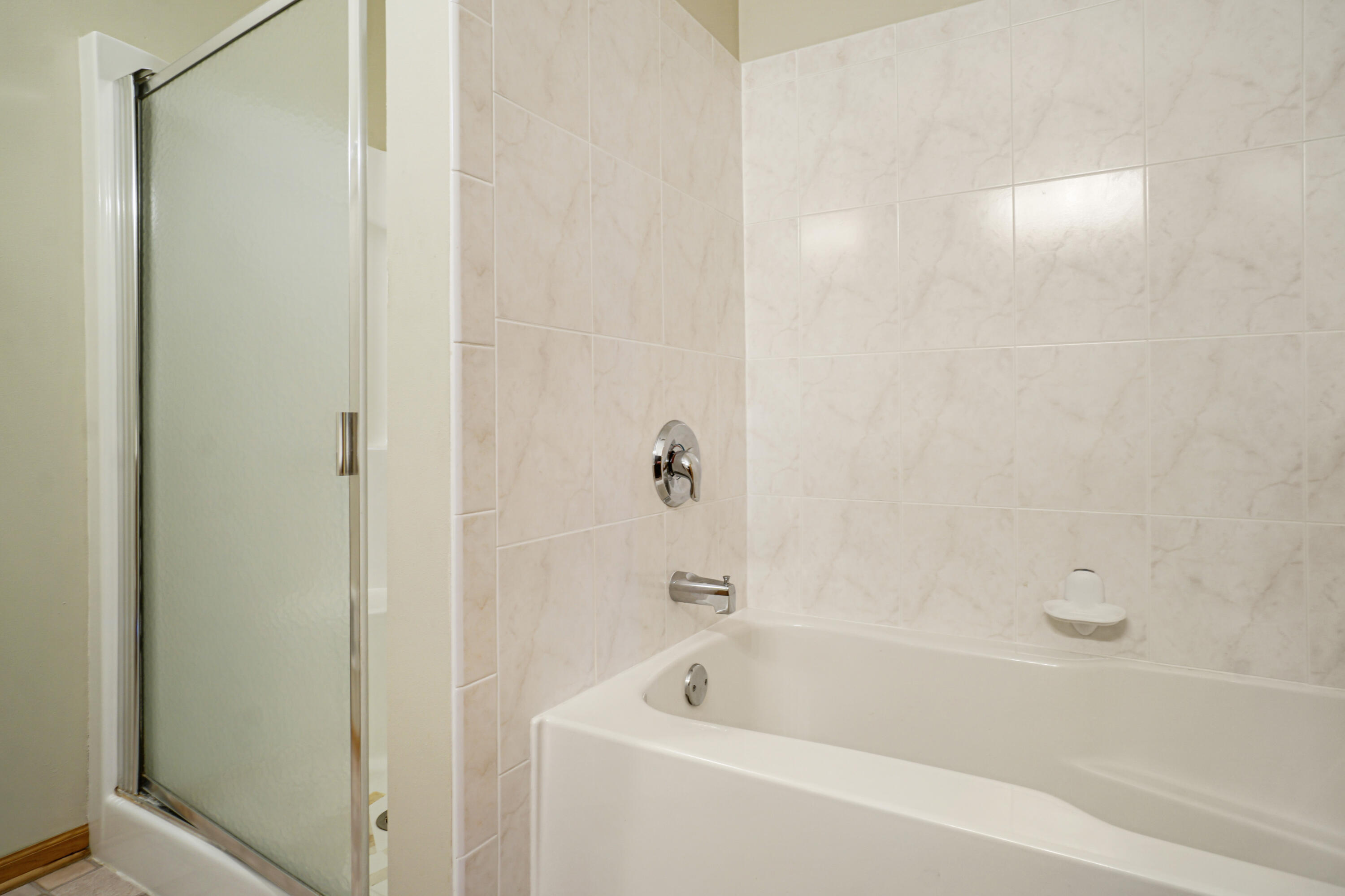 223 5th Street, Unit 211 Hartford, WI 53027 - Photo 18 of 31 Primary Ensuite