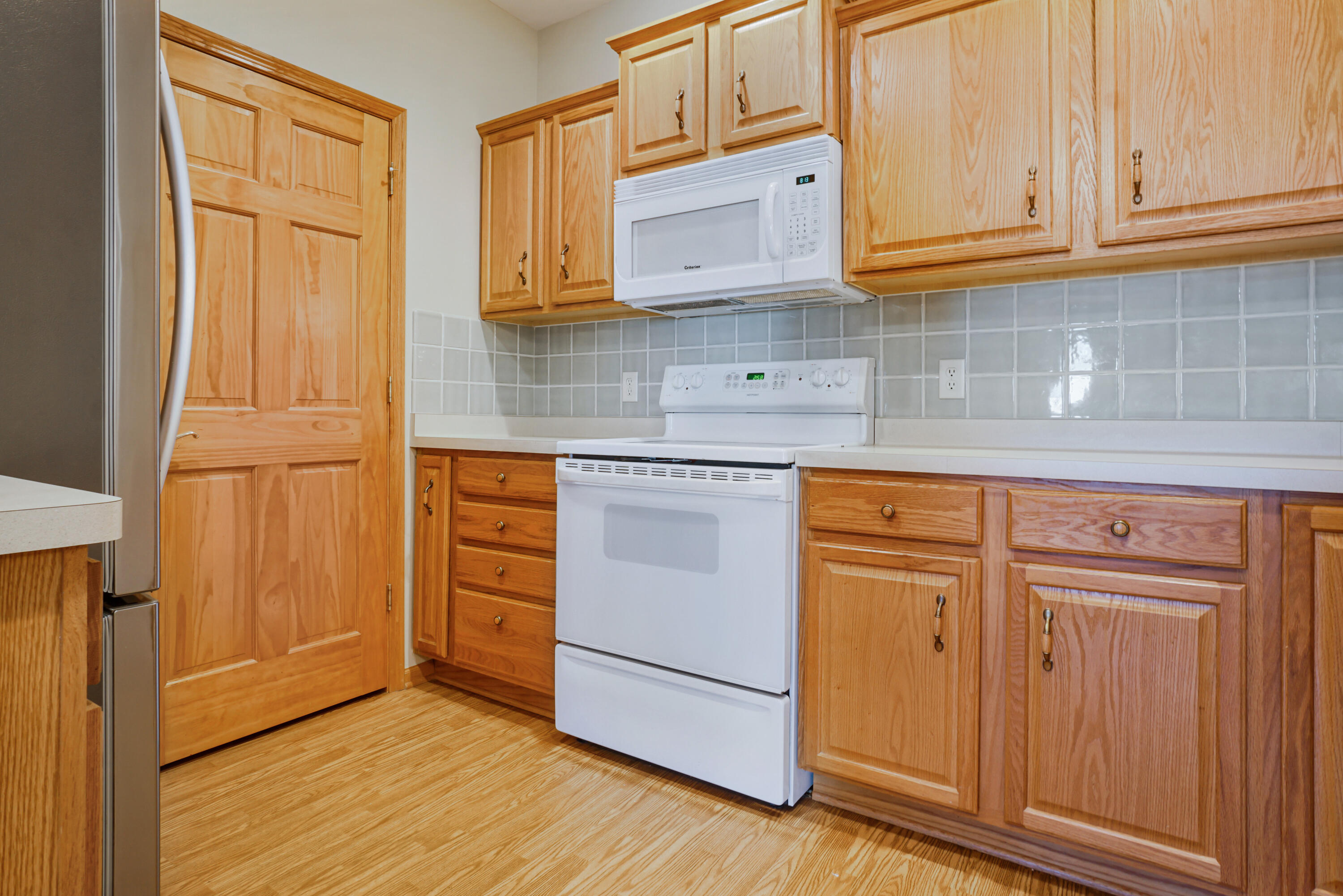 223 5th Street, Unit 211 Hartford, WI 53027 - Photo 9 of 31 Kitchen