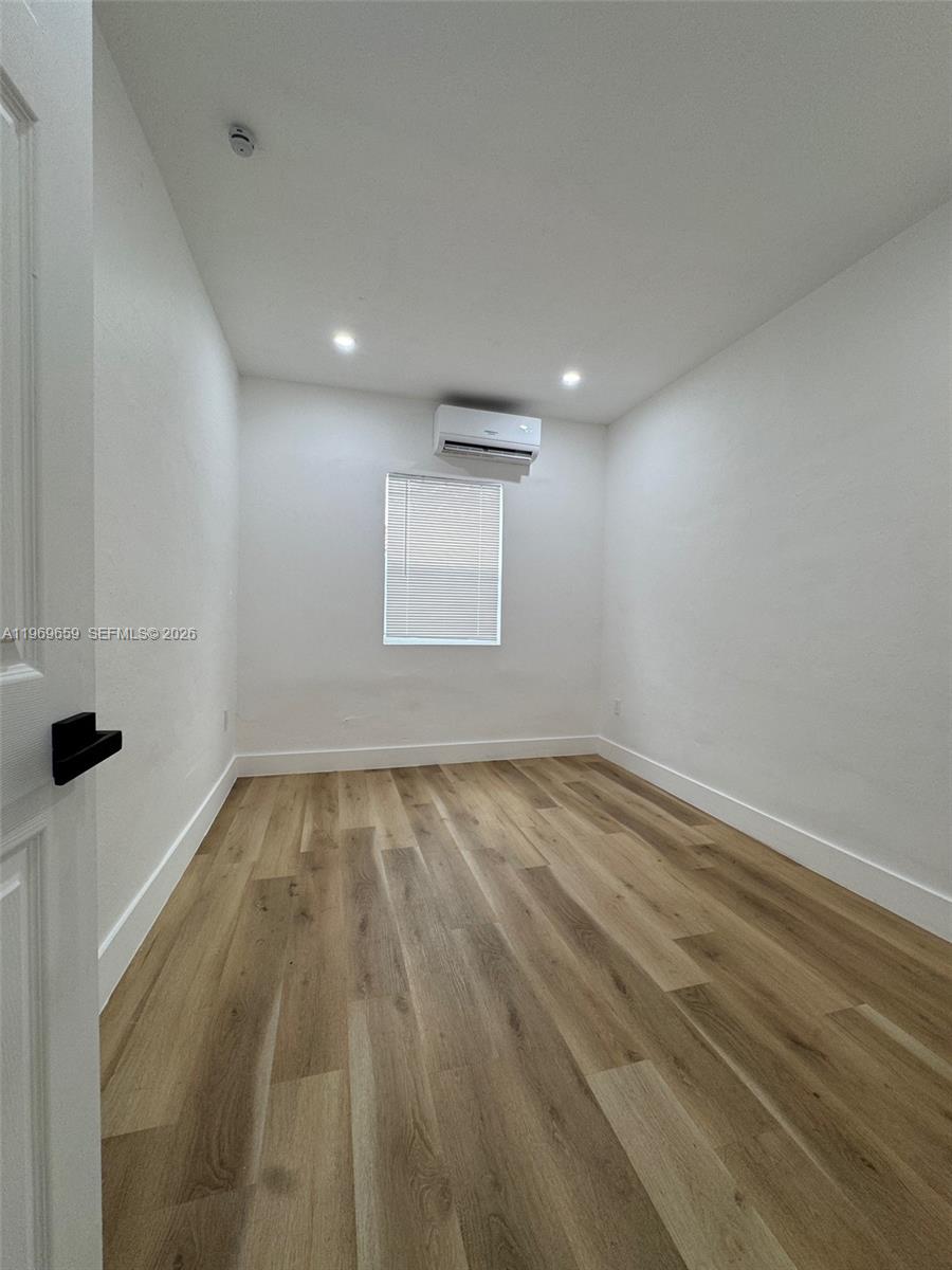 4028 Southwest 11th Street, Unit 4B Miami, FL 33134 - Photo 8 of 10 en empty room with window