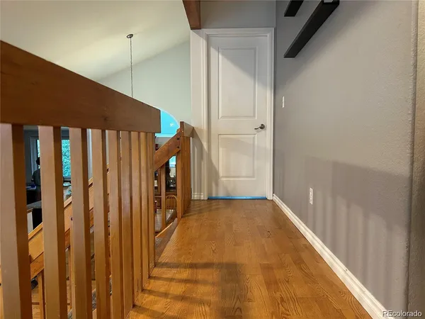 a living room with a couch and a large window