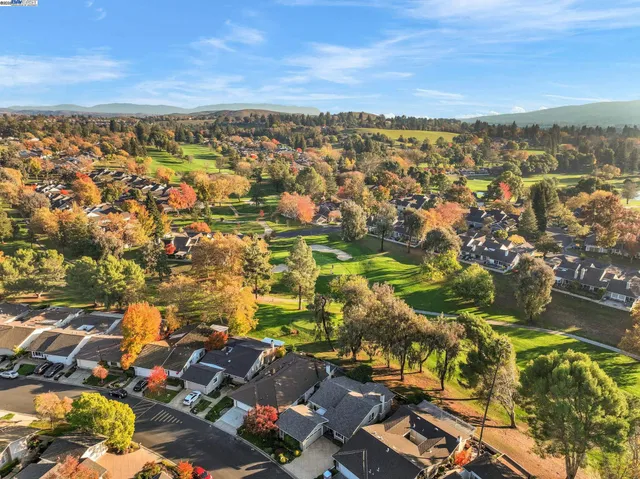 an aerial view of residential building with parking space
