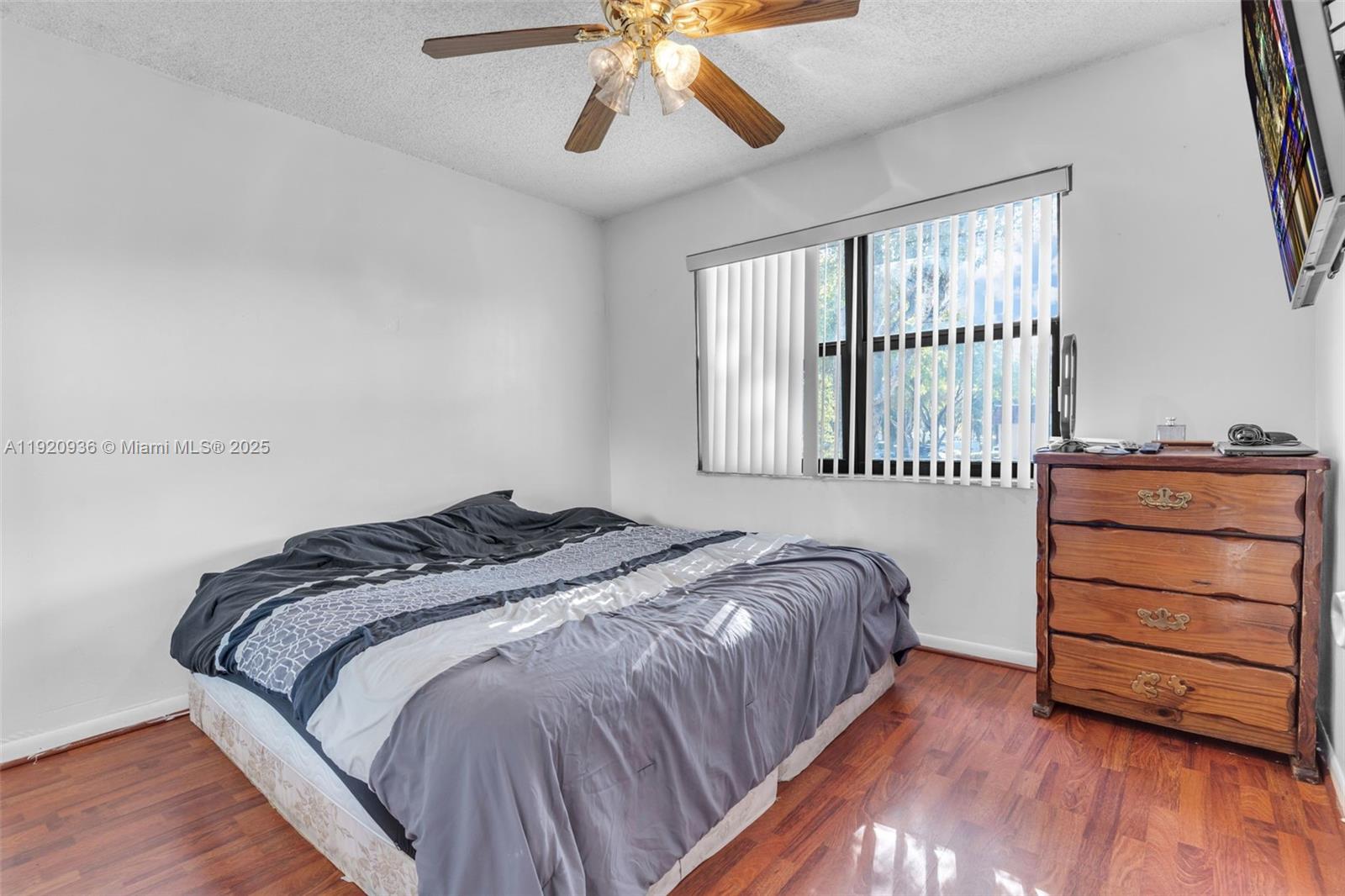 14865 Southwest 104th Street, Unit 2622 Miami, FL 33196 - Photo 14 of 24 a bedroom with a bed and a window