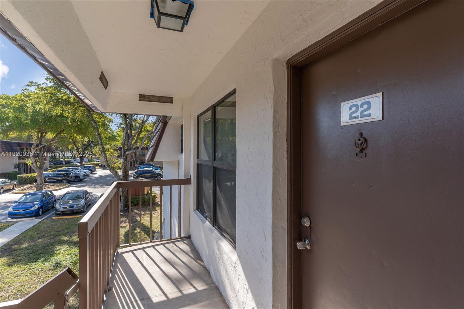 14865 Southwest 104th Street, Unit 2622 Miami, FL 33196 - Photo 2 of 24 a view of a balcony having furniture