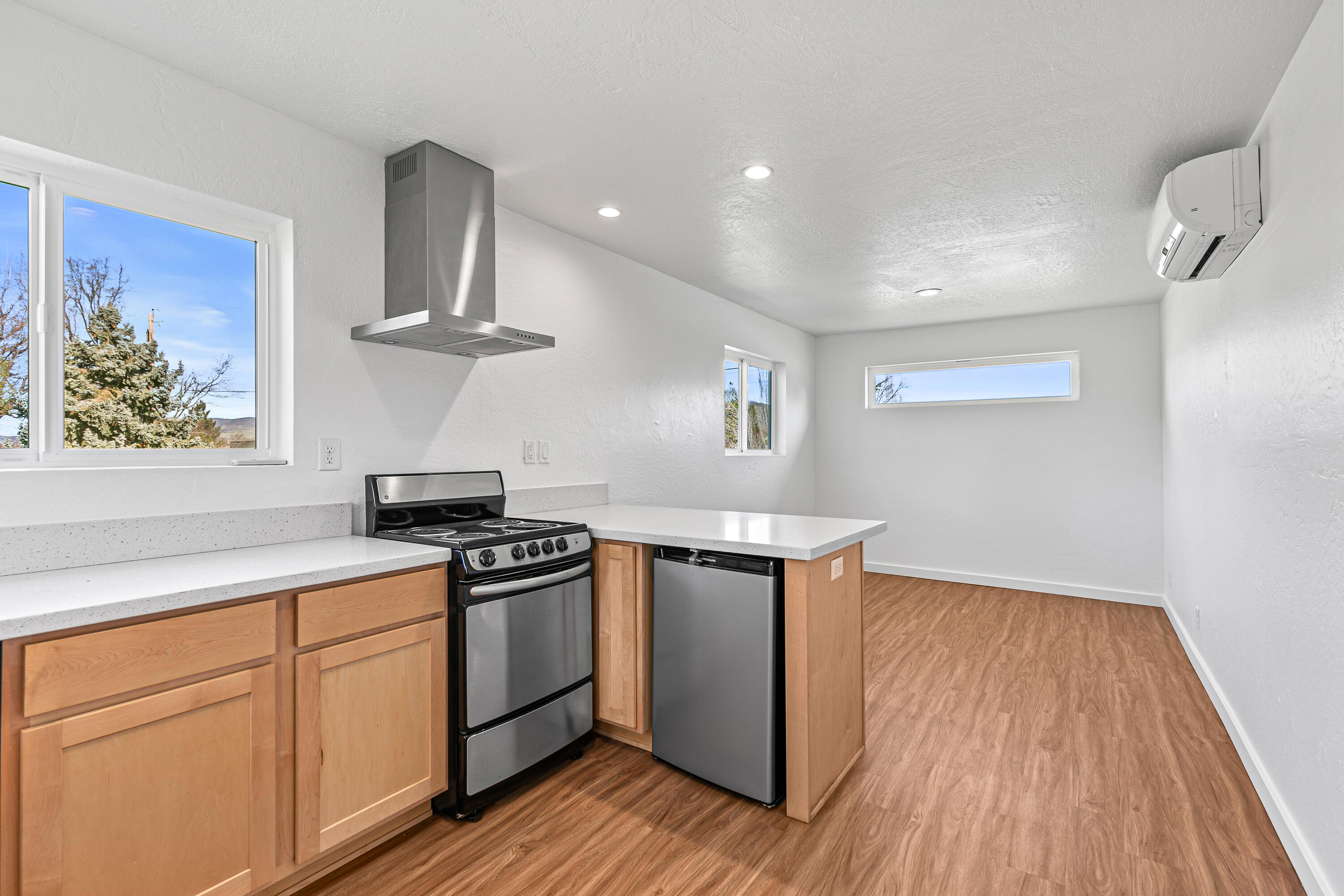 593 Crowson Road Ashland, OR 97520 - Photo 29 of 36 a kitchen with a stove and a wooden floors