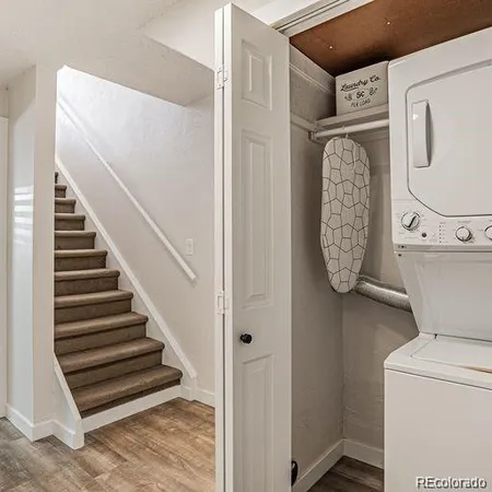 a view of entryway with washer and dryer