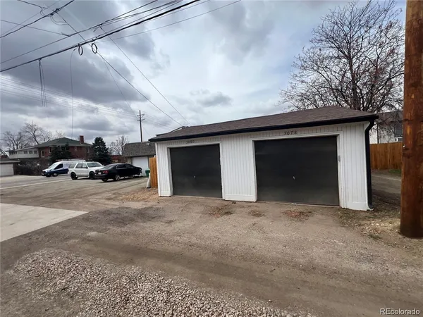 a view of car parked in front of house